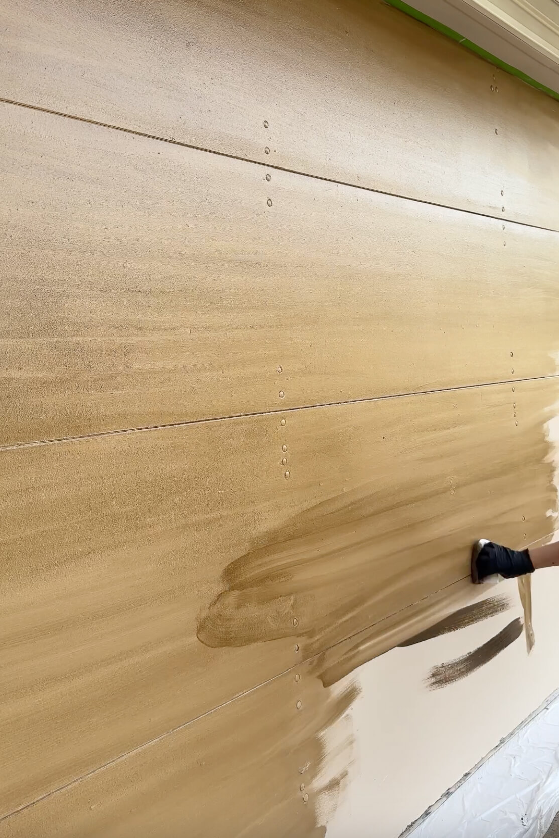 Blending gel stain to on a garage door.